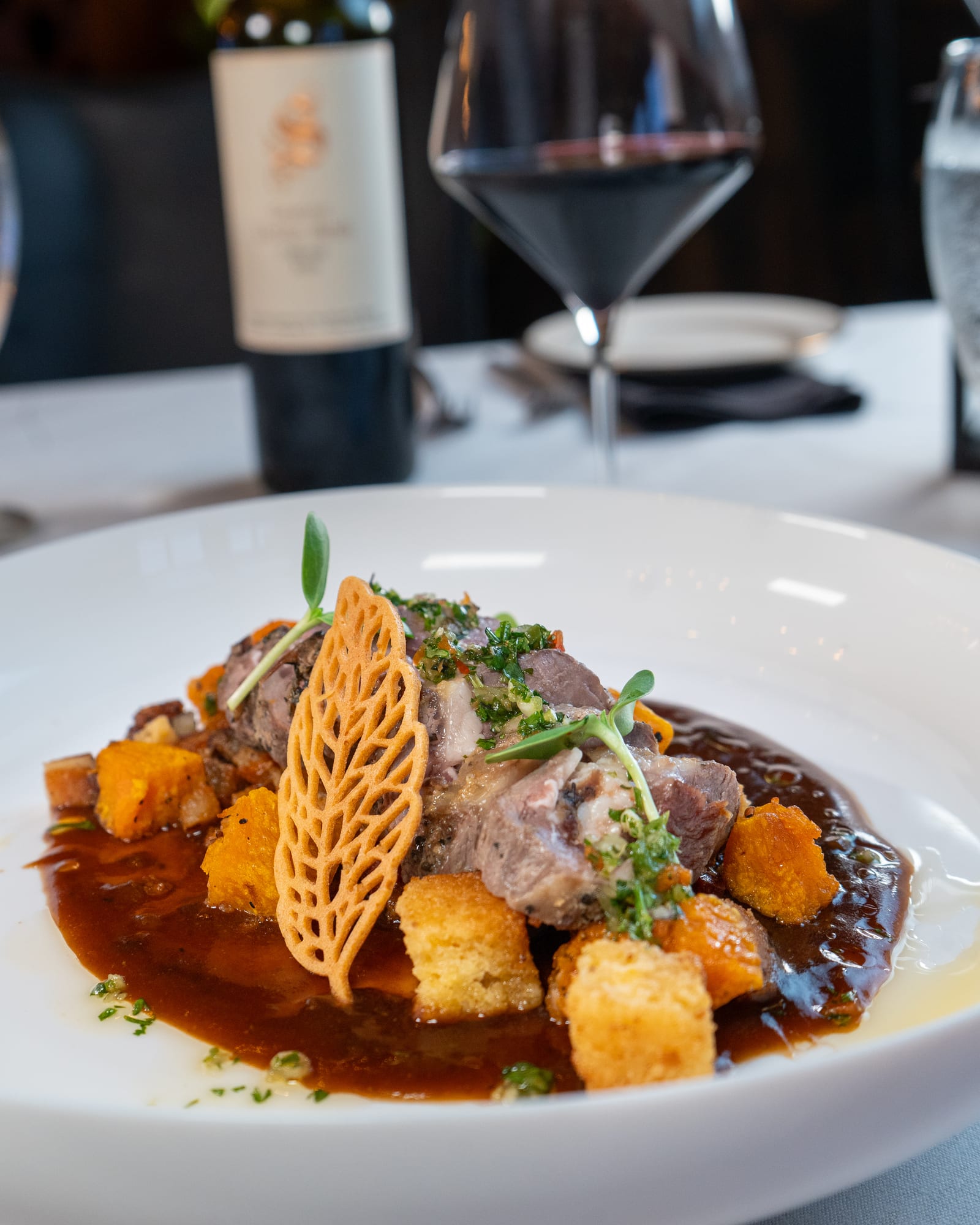 Chef's plated course at La Cocina at The Cellar Upstairs